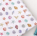 貝殻、貝殻、ヒトデの模様の生地(韓国製、半ヤード単位)