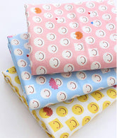 韓国製のスマイルフェイス柄生地(半ヤード単位)