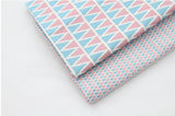 パステルブルーピンクの三角形の模様の生地(韓国製、半ヤード単位)