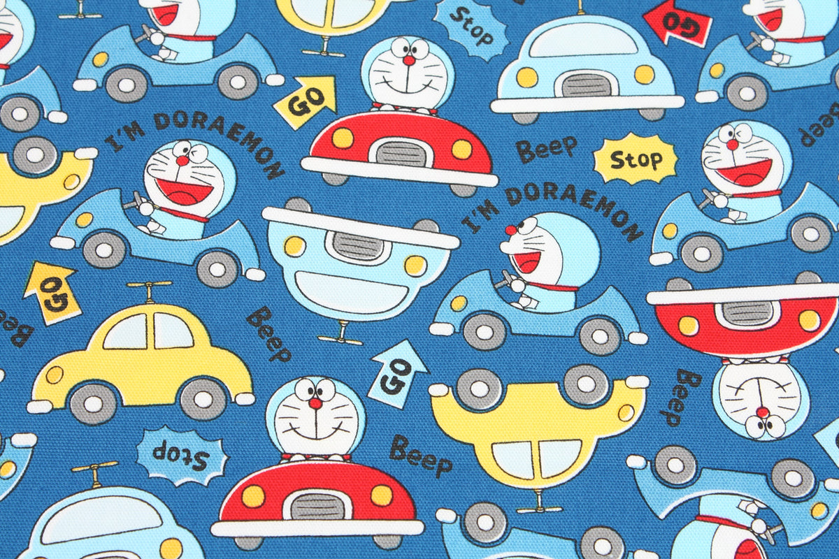 I am Doraemon Car Driving Oxford Licensed Fabric printed in Japan by the Half Yard