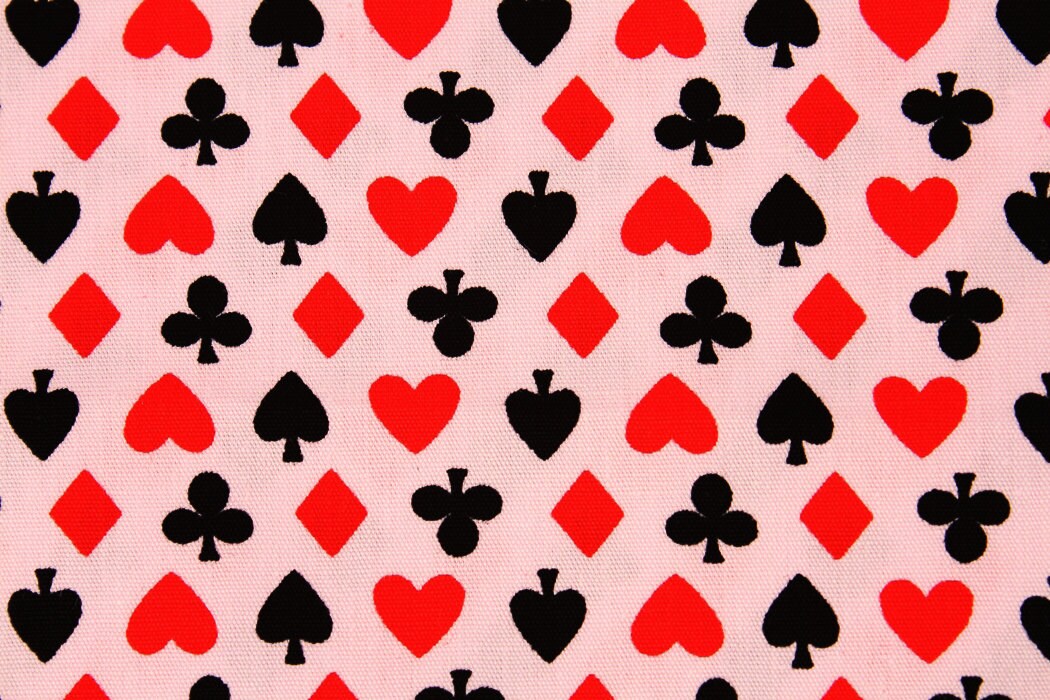 Cards Hearts and Knaves Diamonds and Spades on Pale Pink Fabric made in Korea by the Half Yard