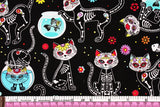 Timeless Treasures Fabrics の黒いスケルトン猫の子猫の生地 (半ヤード単位)